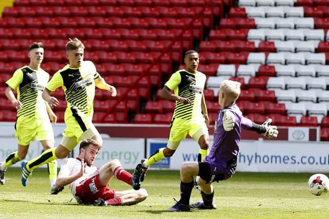 Ben Whiteman scores for Sheffield United's under-21's during their play-off final against Huddersfield Town Â©2016 Sport Image all rights reserved