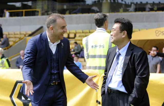 Carlos Carvalhal, left, with chairman Dejphon Chansiri