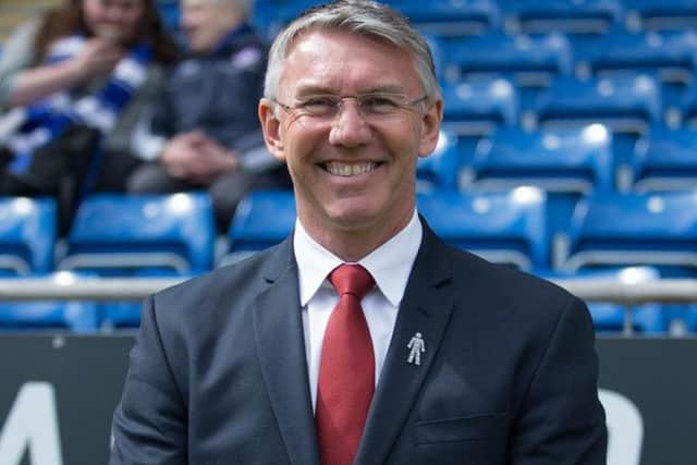 Nigel Adkins is a very different kind of manager to Wilder