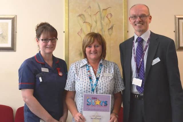 Photo Shows: (l-r): Nicki Sherburn, Matron; Carol Whitehead, Ward Clerk and Mike Pinkerton, Chief Executive