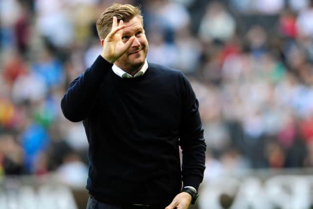 But MK Dons manager Karl Robinson has threatened to block his dream move