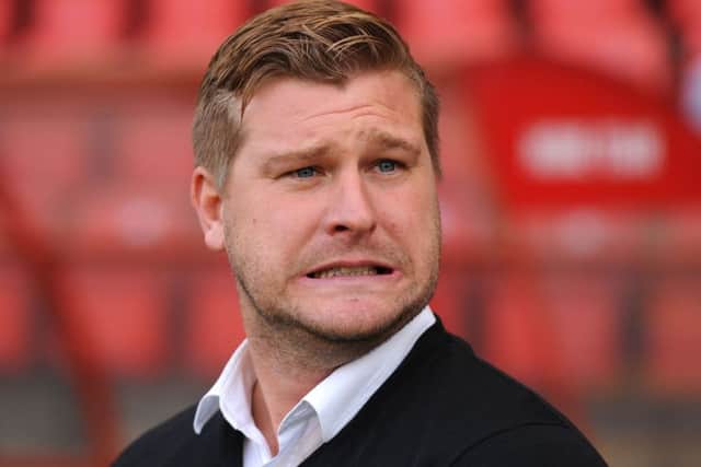 Karl Robinson accepts the situation with McFadzean is awkward after receiving the defender's transfer request