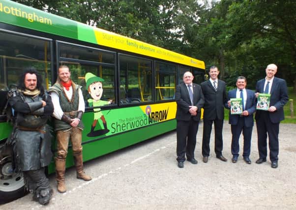 Announcing the Sherwood Arrow as the travel partner for the Robin Hood Festival are (fromt left) Mark Williams (Sherrif of Nottingham), Steve Warrington (Robin Hood),  Andy Smith, Jason Dixon (both Stagecoac), Coun Kevin Greaves, Coun John Knight (both Nottinghamshire County Council).