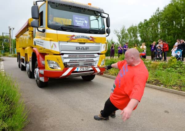 Simon Power Plant, who recently broke a Guinness World Record for pulling a 13 tonne truck one handed at Bluebell Wood Childrens Hospice (photo: Antony Oxley).