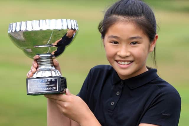 Handicap Champion Amelia Wan is presented with her trophy by Lee Westwood's mum Trish. Lee Westwood Junior Golf Championships 2016 held at Worksop Golf Club on Monday July 25th. Photo: Chris Etchells