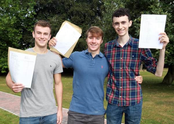 A-level results day at Queen Elizabeth's High School in Gainsborough. Pictured are Harry Mann, Ben Skelton, and Ollie Powell. Photo: Chris Etchells