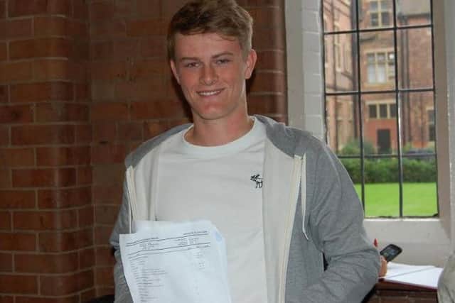 Nick Lowe with his A-Level results.