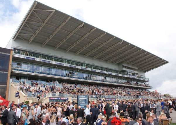 WE LOVE THE LEGER! -- packed crowds are guaranteed at Doncaster next week for the four-day Ladbrokes St Leger Festival.