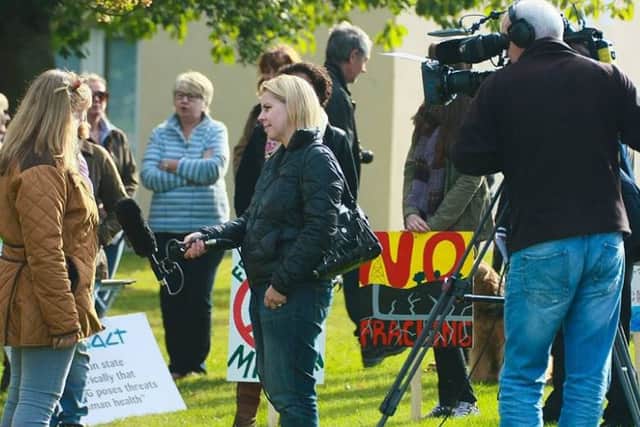 A local TV news channel interview demonstrators at the site. Photo by Mick Hickman.