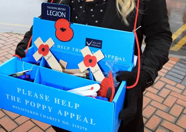 Poppy selling with the Worksop branch of the Royal British Legion. Guardian reporter Sophie Wills.