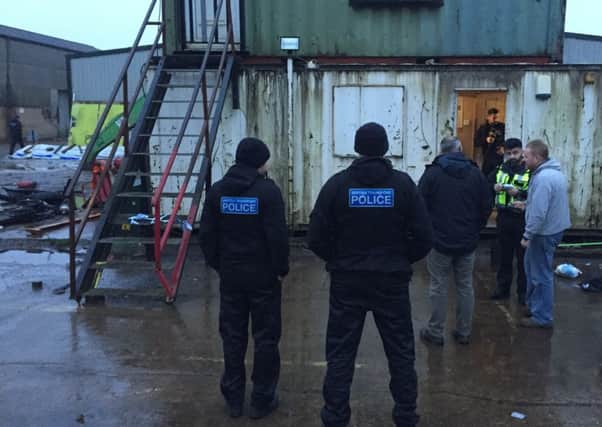 Officers at a scrap metal site in South Yorkshire