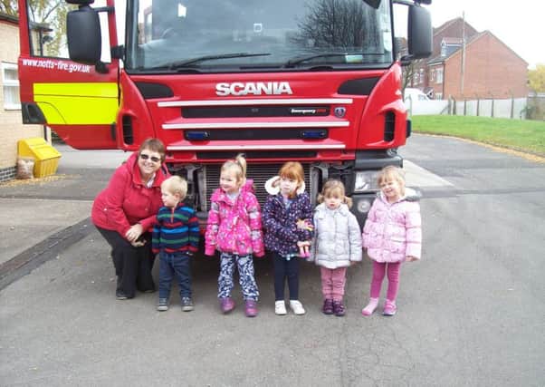 Speckled Frogs Pre-School (pictured on a visit to Misterton fire station) has received a split rating of outstanding and good from Ofsted