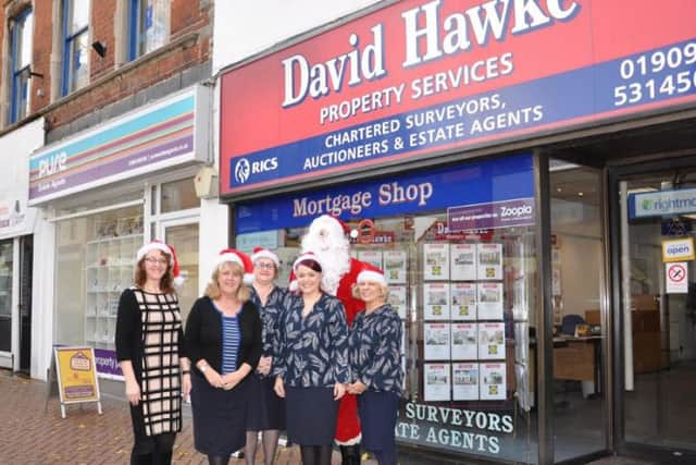 Julie Leigh, cabinet member for neighbourhoods at Bassetlaw District Council, joined officer manager Val Casey and her team along with Father Christmas outside the firm this week to kick-start the appeal.