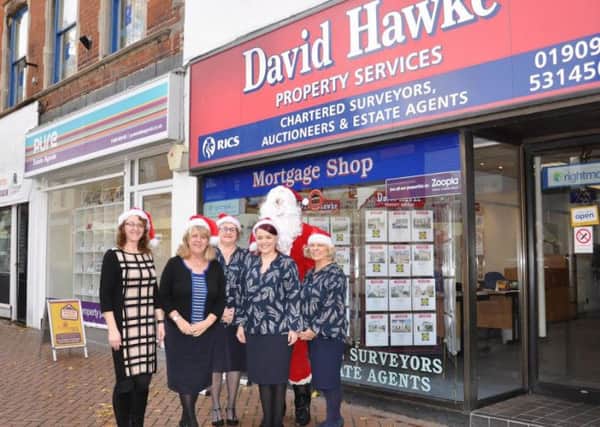 Julie Leigh, cabinet member for neighbourhoods at Bassetlaw District Council, joined officer manager Val Casey and her team along with Father Christmas outside the firm this week to kick-start the appeal.