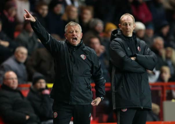 Sheffield United manager Chris Wilder (left) wants even more from his team during tonight's match with Walsall. Pic David Klein/Sportimage