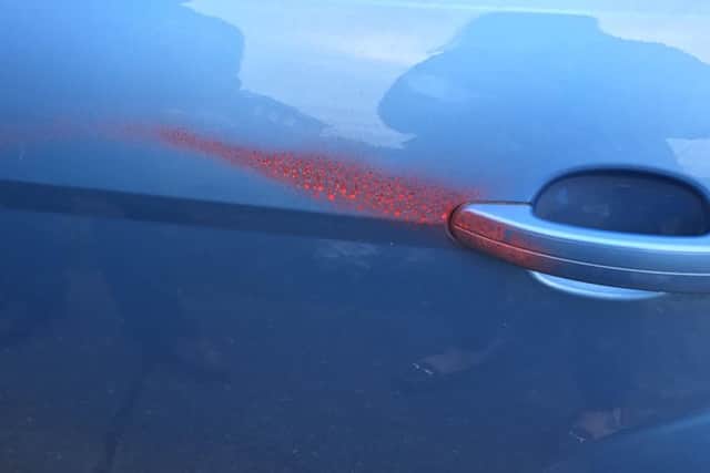 Nurse Laura Jordan's car was spray-painted red.