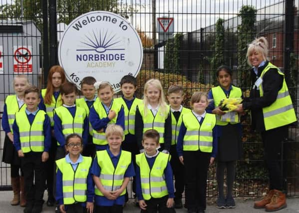 Pupils at Norbridge Academy in Worksop have been donated hi-visibility jackets by builders merchants Gibbs & Dandy