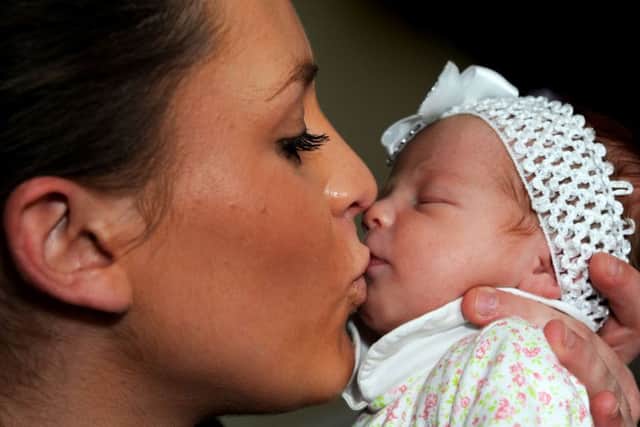 Langold mum, Georgia Burgess-Hall with her baby, Eliza Grace Baker, who was the first baby born on Christmas Day.