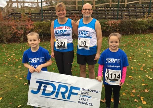 Rob Ferrol with (from left) son Andrew and fellow JDRF fundraisers, Linda Foy and Mia Richards.