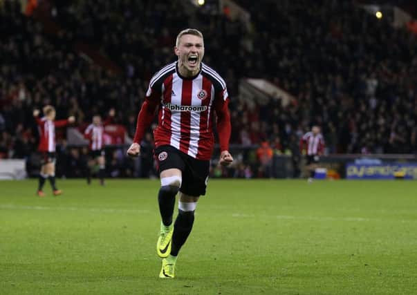 Caolan Lavery is delighted to see Marc McNulty back at Bramall Lane. Pic Simon Bellis/Sportimage