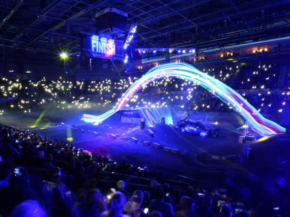 A packed crowd lighting up Sheffield Arena with their mobiles