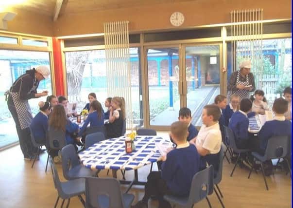 Pupils at Langold Dyscarr School enjoying a meal in their diner