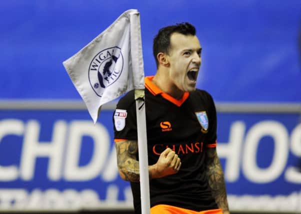 Ross Wallace celebrates his goal against Wigan Athletic