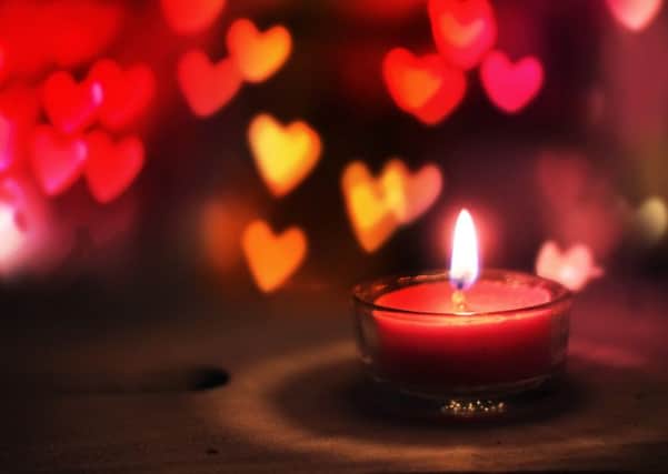 St Valentine's day greeting card with candle and hearts