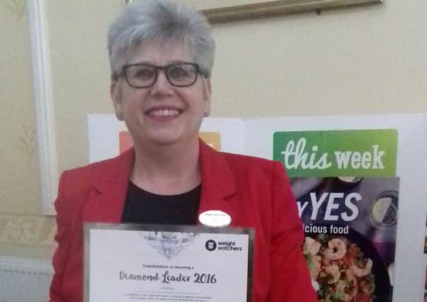 Julie Baines has been given a Diamond Award for her services to Weight Watchers