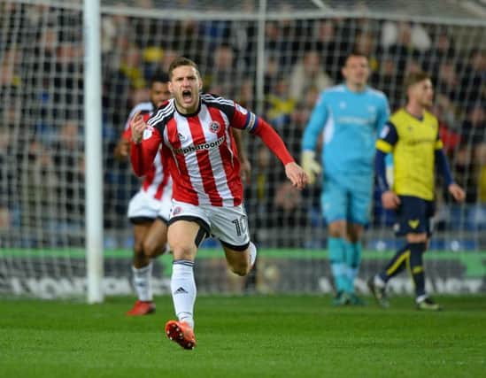 Billy Sharp celebrates on of his 26 goals so far this season.Pic credit should read: Robin Parker/Sportimage