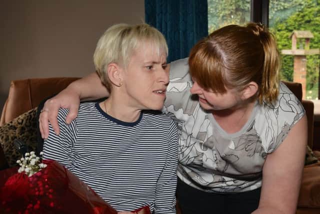 Zoe Edge has been nominated for a Guardian Rose by Joanne Collins for all her charity work, Zoe is pictured receiving her Rose from Joanne