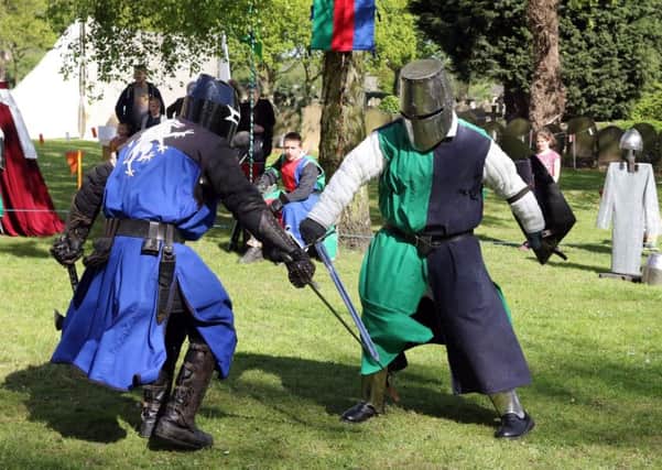 Michael of Royston does battle with Fredrick De Dawthorne.