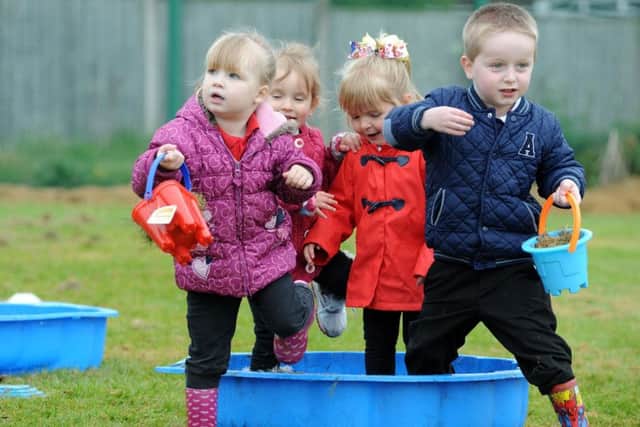 Pupils from the Priory Academy take part in the Peppa Pig puddle walk following their picnic to raise funds for the Wish Upon a Star charity, on Friday.