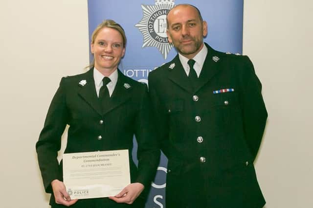 PC Julie Meaney is congratulated by Chief Superintendent Mark Holland