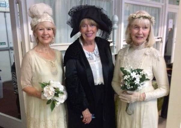 Notty Hornblower (centre) showed off a range of Edwardian costumes at the North Notts Creative Textiles Group meeting