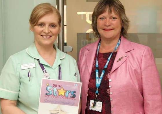 Andrea is pictured with Suzy Brain England.