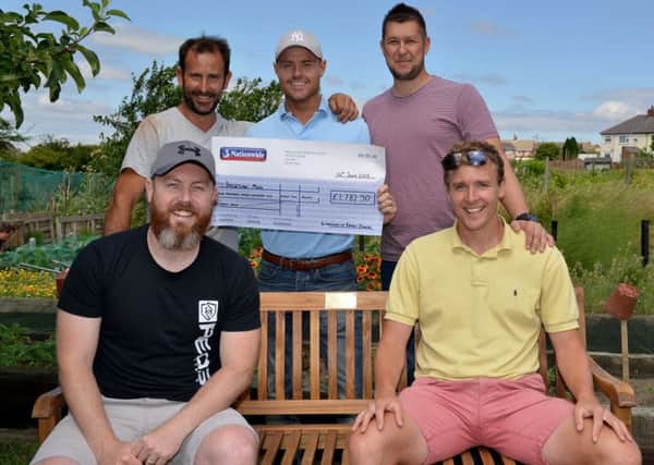 Cheque presentation to Bassetlaw Mind, following a three peaks challenge, pictured are the walkers including Paul Dawson, Gary Clarke, Philip Spacey, Gavin Brady and Diego Gomez