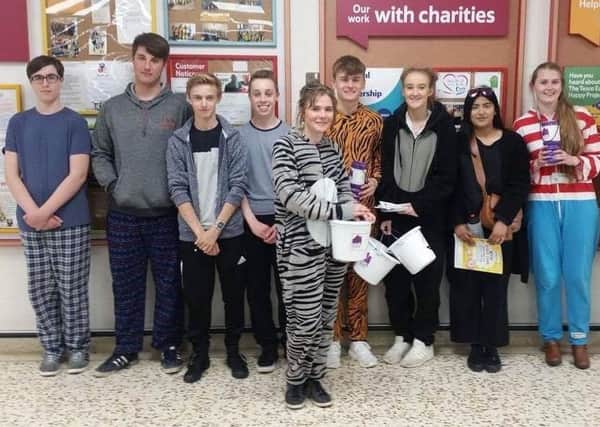 A picture of Team 6 Wave 2 after their bag packing activity.