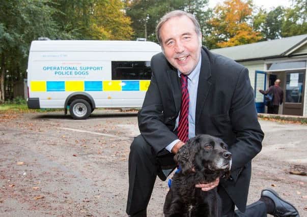 Paddy Tipping with a police dog