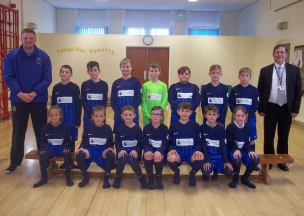 Langold Dyscarr pupils in their new football kit