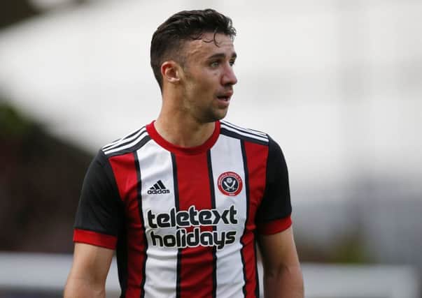 Enda Stevens is proud Sheffield United are doing things differently: Simon Bellis/Sportimage