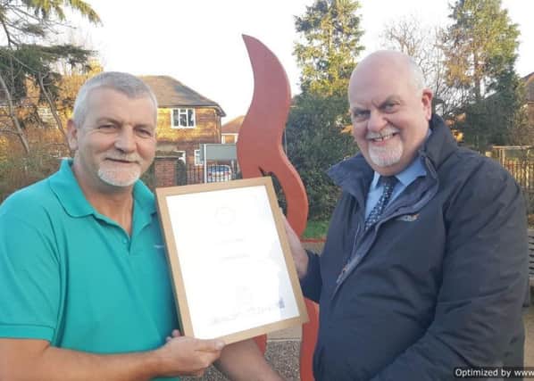 Gainsborough in Bloom secretary, Vaughan Hughes, presents Colin Stubley a Judges Special Award for his enthusiastic gardening maintenance and colourful planted boxes at the John Coupland Hospital.