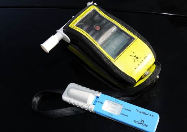 A breathalyzer and drug swob. Picture: Andrew Roe