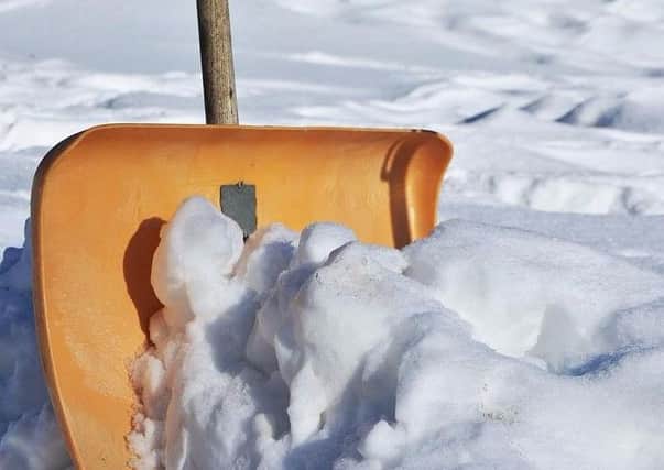 Many homeowners are concerned about clearing snow and ice from around their properties in case they are held responsible if someone falls.