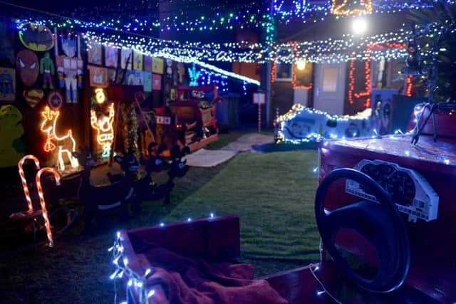 Tony McManus decorates turns his garden into a winter wonderland raising money for charity