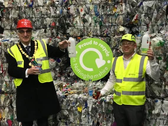 Recycle For charity - Councillor John Handley, chairman of Nottinghamshire County Council and Wayne Draycott, treatment manager at Veolia