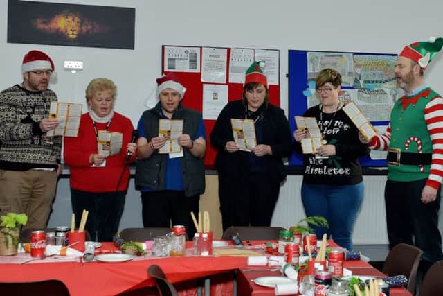 The 7 Project at Gospel Hall, Worksop held a free Christmas dinner for homeless people, pictured are the volunteers practicing their singing