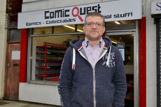 Adam Hall, owner of Comic Quest on Hardy Street.
