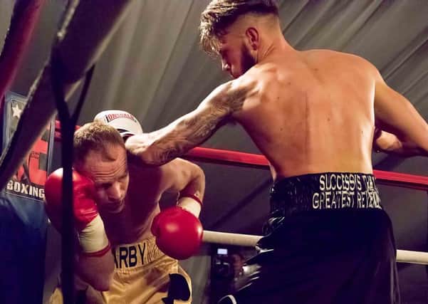 Kyle Fox, who tops the bill, on his way to victory over veteran William Warburton in November. (PHOTO BY: Andy Garner)