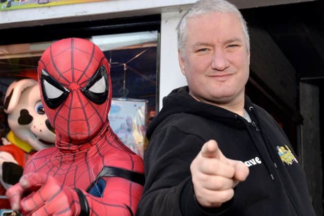 Action Hero Parties shop on Bridge Street was broken into and a quantity of toys stolen. Owner Dave Graham is pictured with Spiderman